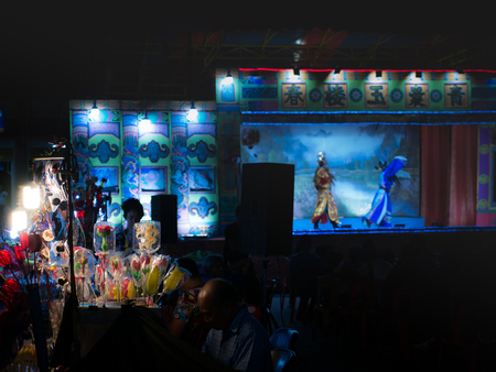23 Dec'17 Surin Province Thailand : Candy Mold was Made from Sugar in Chinese Opera Celebration of The City Pillar Shrine in front of The Country Train Stationのeditorial素材