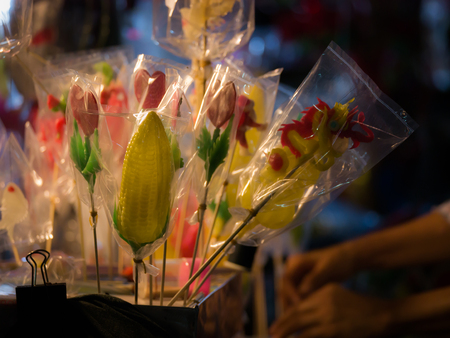 23 Dec'17 Surin Province Thailand : Candy Mold was Made from Sugar in Chinese Opera Celebration of The City Pillar Shrine in front of The Country Train Stationのeditorial素材