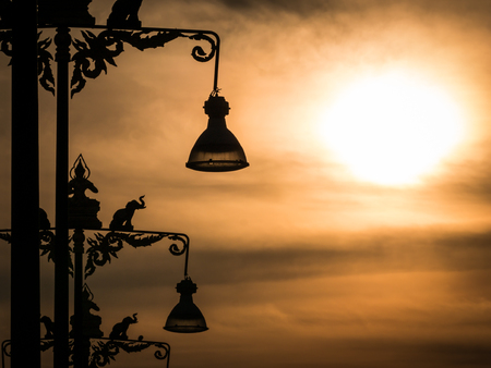 The Lamp Posts are a Statue of Elephants and Angels Behind The Sun