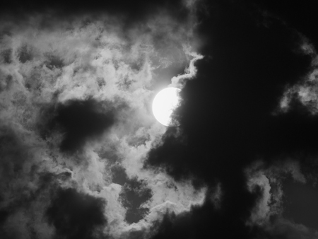 The Sun Hides behind The Gray Cloudsの写真素材