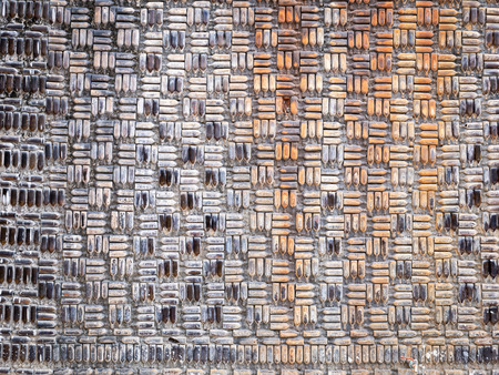 The Temple Wall Made from Glass Bottles and Cement in Thailandの写真素材