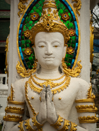 Angel Statue Press The Hands Together at The Chest in The Templeの写真素材