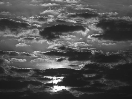 The Sun Rises Below The Picture on a Cloudy Day in Black and White Picture