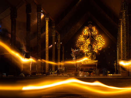 21 Oct'21 Wat Sirindhornwararam Ubon Province Thailand : The People Walking with Candles to be Light Lines around The Chourch on Religious Holidayのeditorial素材