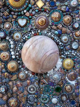 The Marble Ball in The Center Surrounded by The Sangkhalok Bowl Lid with Stones Decorated The Wall in The Pagoda of Wat Phra That Pha Son Kaew on The Hillの写真素材