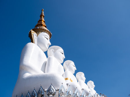 The Side View of  5 White Buddha Statues Sitting on The Hill in Khao Kho Phetchabun Province Thailandの写真素材