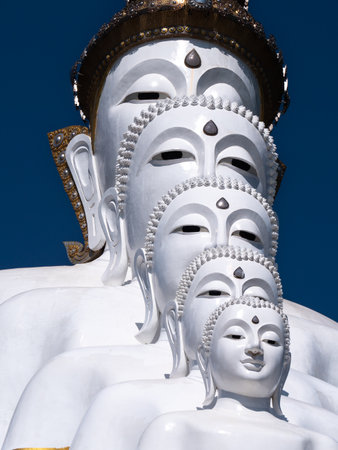 The Faces of  5 White Buddha Statues Sitting on The Hill in Khao Kho Phetchabun Province Thailandの写真素材