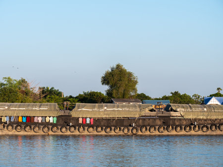 The Shirts were Dried on The Large Sandboat on The Chao Phraya Riverの写真素材