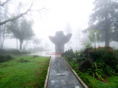 The Ho Chi Minh Friendship Monument in Sapa Central Park , Vietnam anomg The Fogの写真素材