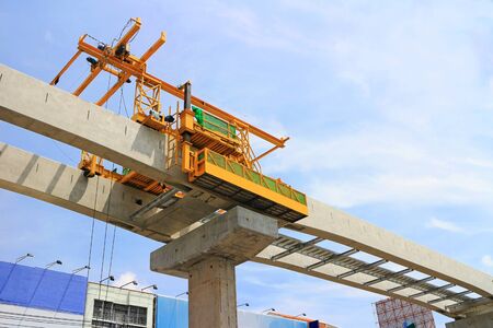 Mobile Hoist Machine working on The Concrete Beams for Sky Train under Construction