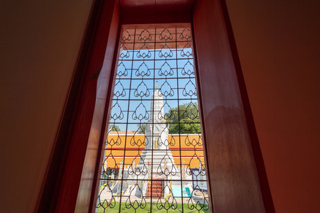 Stupa inside a temple in Thailand shot from inside the temple hallのeditorial素材