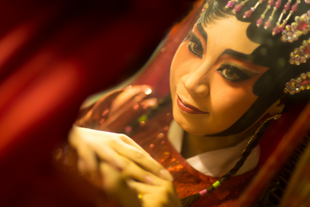 Bangkok, Thailand- October 28, 2014: Chinese opera actress looking checked her makeup before the play begin at Chinese temple on soi Charoen Krung 79のeditorial素材