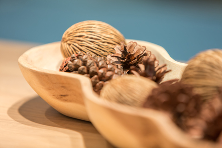 Christmas Natural Decoration on wooden tray with Pine cones tree seeds .の写真素材