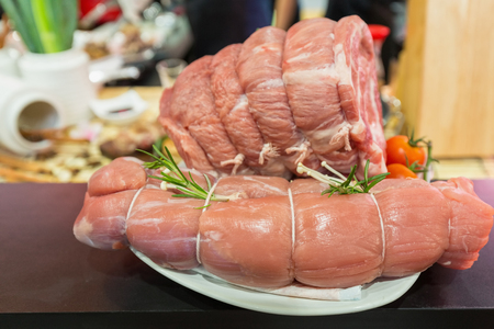 Prepared raw pork meat ready for cooking.の写真素材