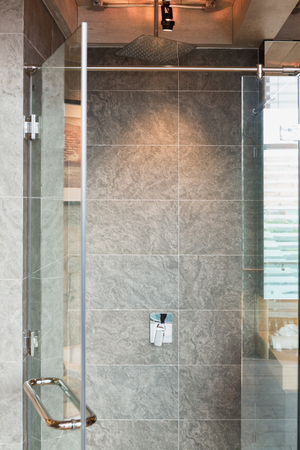 Glass Shower box  in a loft style bathroom.の写真素材