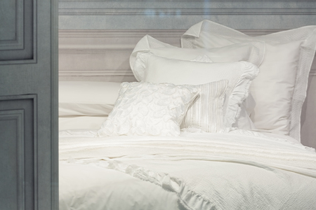 White clean pillows and white blanket.の写真素材