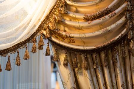 Golden and white see through curtain in luxury style.の写真素材