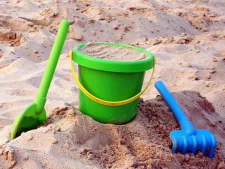 Toys in the sandの写真素材