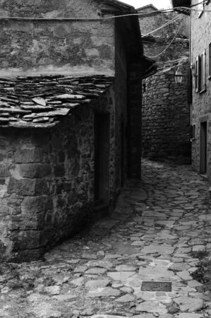 Romantic foreshortening in the alleys of Rocca Ricciarda, a small town lost in the Tuscan Apenninesの写真素材