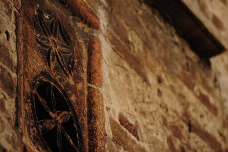 Architectural detail: stylized flowers in a bas-relief frameの写真素材