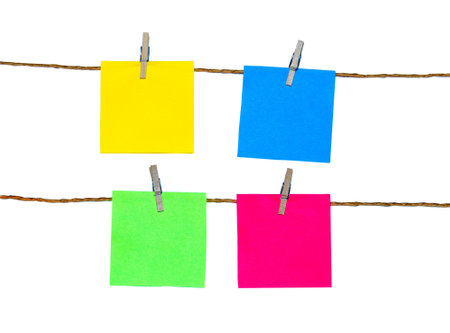 Stickers clipped on the rope isolated on white backgroundの写真素材