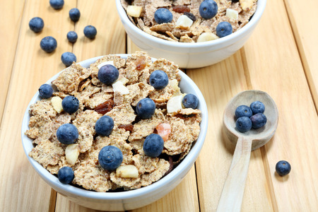 Healthy whole grain muesli and bran breakfast with fruits