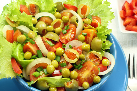 Vegetable salad with tomatoes, peppers and peas の写真素材