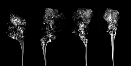 Abstract white smoke collection on black backgroundの写真素材