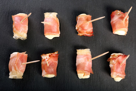 Mini mozzarella wrapped in schwarzwald ham and bakedの写真素材