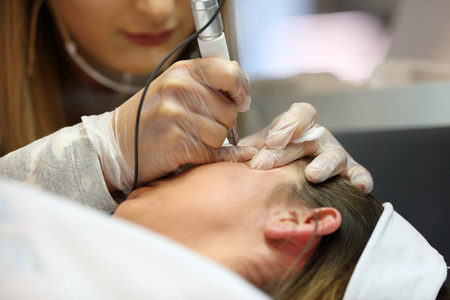 POZNAN, POLAND - MAY 07. 2016: Young girl during makeup process at The Look Beauty Vision Poznan 2016 on May 07 in Poznan, Poland.のeditorial素材