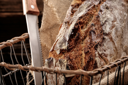 Spelled bread on wooden background and empty space for textの写真素材