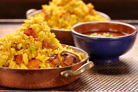 Chicken with basmati rice fried in stainless pan
の写真素材