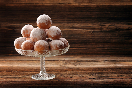 Delicious donuts on wooden background and empty space for text
の写真素材