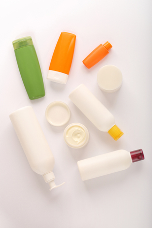 Sunblock cosmetic bottle set and sunscreen on white background.の写真素材