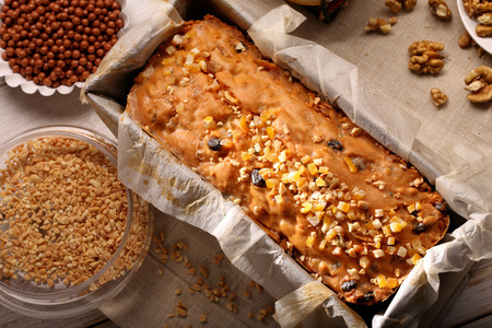 Easter fruit cake in baking mold with empty space for text