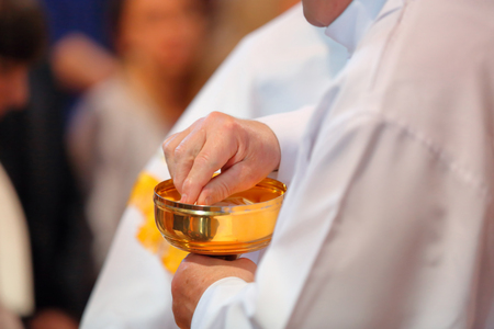 Priest celebrate mass at the church and empty place for text

の写真素材