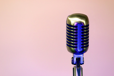 Retro microphone at concert and empty space for textの写真素材
