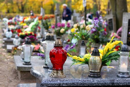 Polish traditional cemetery on the feast of all saints day at 1st November and empty space for textの販売画像