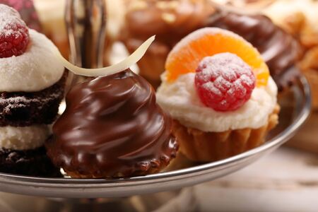 Sweet cookies, closeup of various kinds of cakes on event or wedding reception