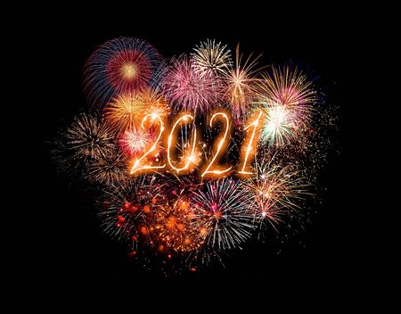 Happy new year greeting card with 2021 golden numbers and fireworks series on dark background with...