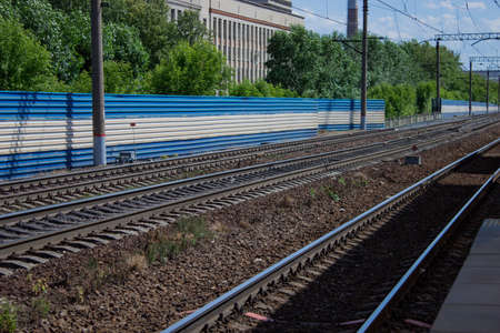 Railway Tracks and Switch near Train Station.