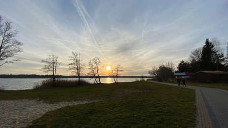 orange, sunset over, lake, poland, golden haur, water, sun, treesの写真素材