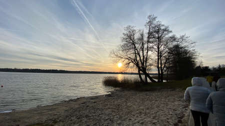 orange, sunset over, lake, poland, golden haur, water, sun, treesの写真素材