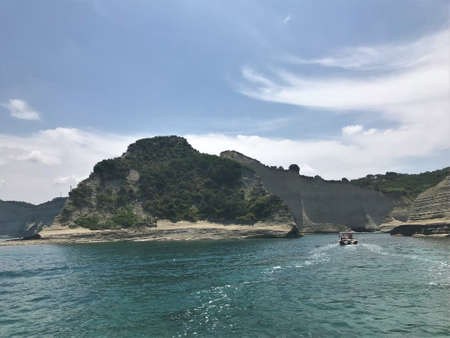 the coast of the island of Corfu in Greece impresses with a beautiful landscapeの写真素材