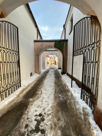 Miasto WÅodawa Lubelskie Voivodeship / Poland February 21, 2021 snow hanging from the roof of the buildingのeditorial素材