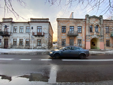 Miasto WÅ‚odawa Lubelskie Voivodeship / Poland February 21, 2021 snow hanging from the roof of...