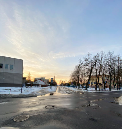 The city of WÅodawa, voivodship. Lubelskie / Poland, February 21, 2021. City view, street houses before winter sunsetのeditorial素材