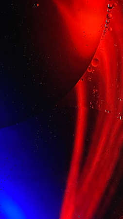 abstract macro photography colorful background oil drops and air bubbles floating on waterの写真素材