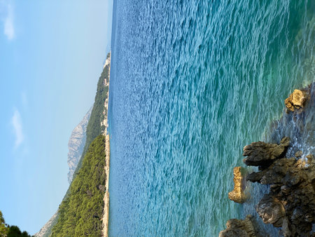 coast maybe adriatic sea beautiful rocky shore in brown colorの写真素材