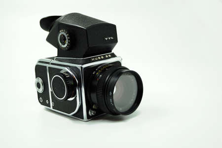 Russian camera from the 1980s isolated in white background. Kiev 88 with TTL range finder. It's a...